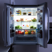 A photo of a fridge with the doors open, full of food